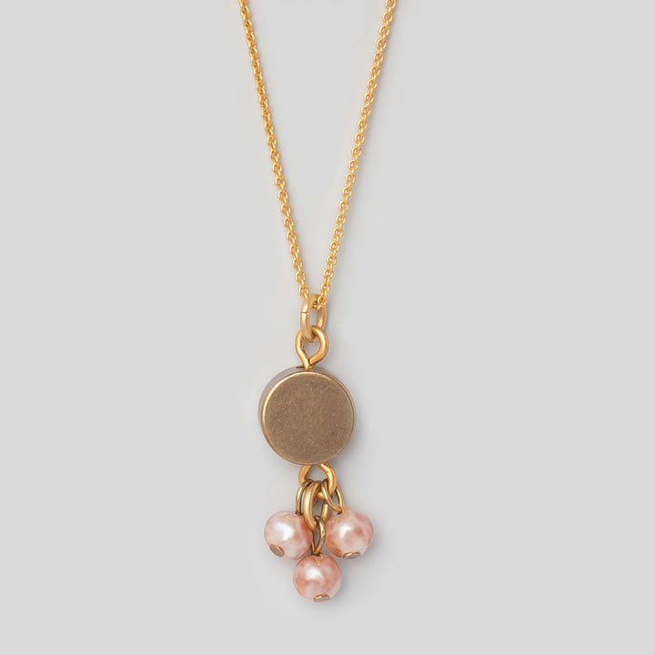 Halskette Disc - roséfarbene Perlen